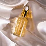 24-Karat Gold Daily Face Serum on Luxury Linen